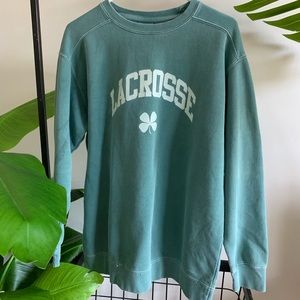 Dark green lacrosse crew neck worn only a few time